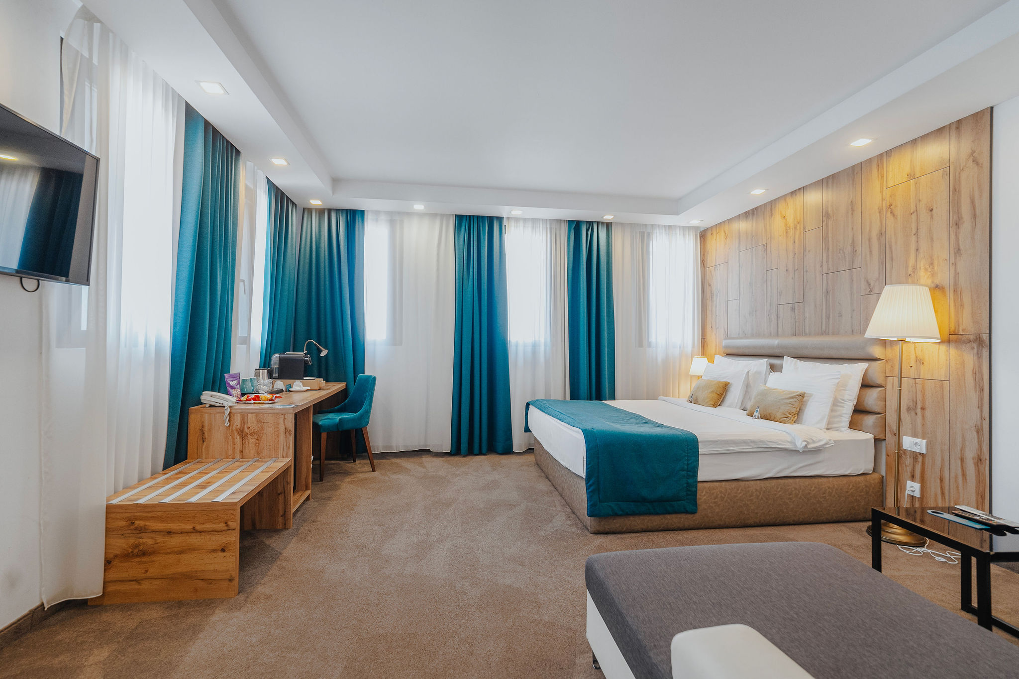 a large and bright hotel room in belgrade